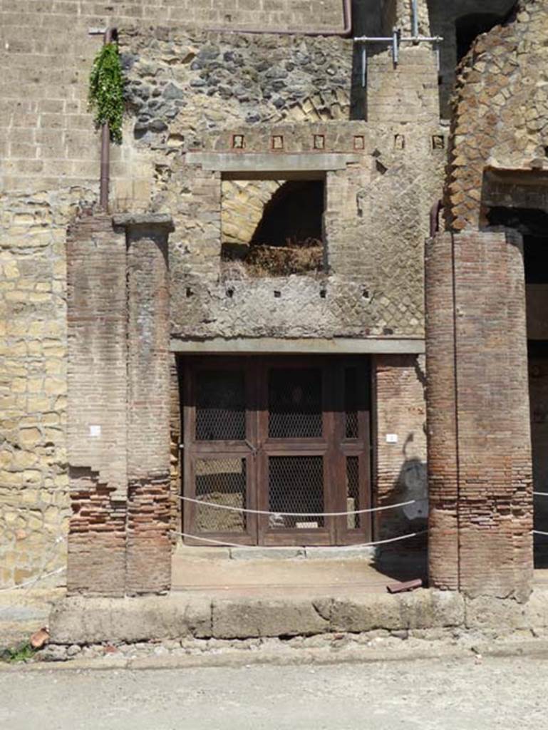 Decumanus Maximus, Herculaneum, July 2015. North side with doorway to a shop numbered 1. Photo courtesy of Michael Binns.